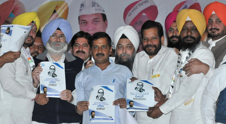 AAP national convener and Delhi CM Arvind Kejriwal along with AAP leaders releases the Dalit manifesto during a rally at Goraya in Jalandhar dist. on Friday.Tribune Photo:Malkiat Singh