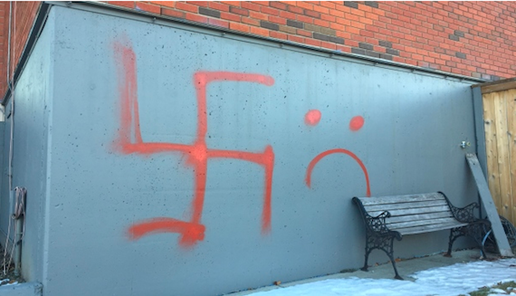 some-of-the-graffiti-spray-painted-on-the-sikh-society-of-calgary-building-cbc